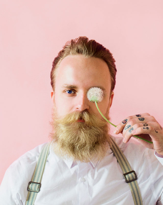 Canva Man Wearing Dress Shirt Holding Dandelion